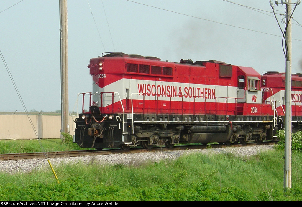 WSOR 2054 leads the Madison to Janesville freight long hood forward